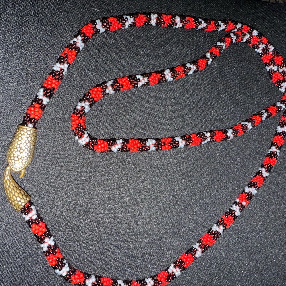 Beaded Coral Snake necklace with two bonus items.